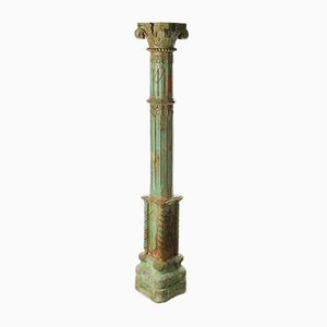 Stone Column und Carved and Patinated Wood