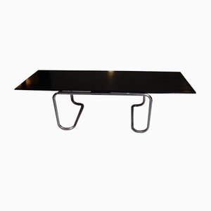 Mesa de comedor o escritorio extensible con patas de acero cromado y superficie de roble negro, años 60