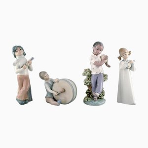 Figurine da bambino vintage in porcellana con strumenti di Lladro, Spagna, anni '80, set di 4