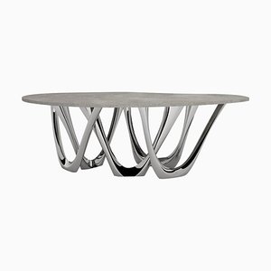 Tavolo G & C, tavolo scultoreo in acciaio inossidabile lucidato, Zieta