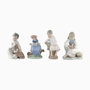 Figuras de niños de porcelana de Lladró & Nao, Spain, años 80. Juego de 4