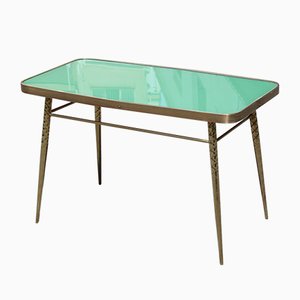 Mesa de centro de latón dorado y superficie de vidrio verde, años 50