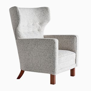 Finnish Pearl Bouclé Fabric and Beech Wingback Armchair by Paul Boman for Boman OY, 1940s