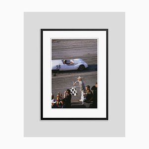 Checkered Flag Oversize C Print Framed in Black by Slim Aarons