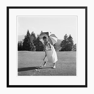 Golfing Hepburn Silver Gelatin Resin Print Framed in Black by Hulton Archive