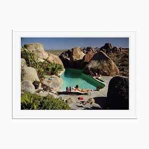 Sunbathing in Arizona Oversize C Print Framed in White by Slim Aarons