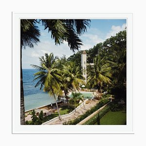 Bahamian Hotel Oversize C Print Framed in White by Slim Aarons