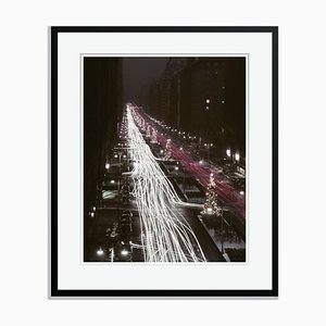 Christmas Traffic Oversize Archival Pigment Print Framed in Black by Slim Aarons