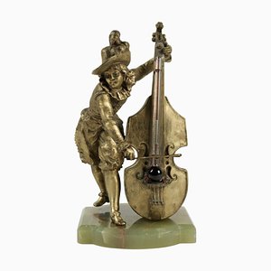 Barometer aus Regula mit Sockel aus Halbedelstein, der einen Cellospieler darstellt