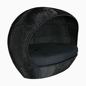 Sofá de exterior Nettuno negro entrelazado de PLT con cojín negro de VGnewtrend