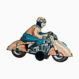 Juguete HKN de motociclista de Huki Kienberger, años 50
