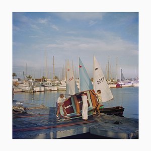 Sailing Dinghy Oversize C Print Framed in White by Slim Aarons