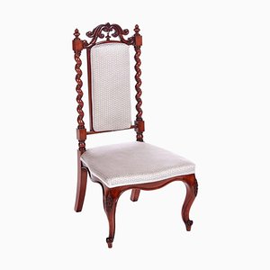 Sedia vittoriana antica in mogano intagliato