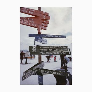 Signpost in St Moritz Oversize C Print Framed in White by Slim Aarons