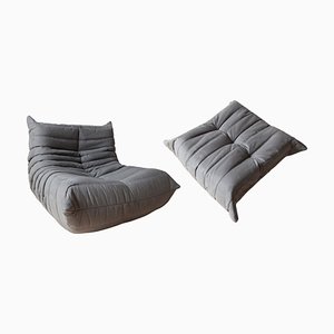 Sillón Togo de microfibra en gris y puf de Michel Ducaroy para Ligne Roset. Juego de 2