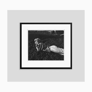 Marilyn Monroe Relaxing on the Grass Silver Gelatin Resin Print Framed in Black by Baron