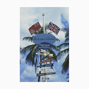 Bahamas Signpost Oversize C Print Framed in White by Slim Aarons