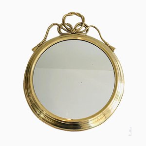 Espejo francés decorativo ovalado de latón, años 70