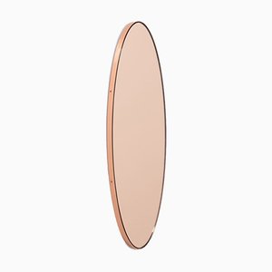 Ovalis™ Oval Shaped Rose Gold Minimalist Mirror with A Copper Frame by Alguacil & Perkoff Ltd