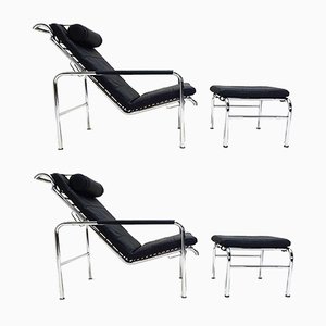 Poltrone reclinabili in pelle nera e poggiapiedi di Gabriele Mucchi, anni '80, set di 4