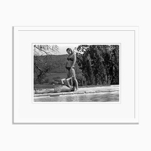 La Piscine Couple Archival Pigment Print Framed in White by Jean-Pierre Bonnotte