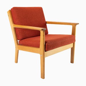 Poltrona de roble y lana roja de Hans J. Wegner para Getama, años 60