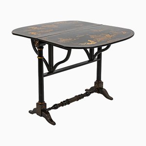 Mesa china de madera lacada en negro, siglo XIX