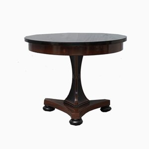 Mesa de centro Biedermeier redonda de caoba y vidrio negro, 1830