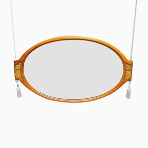 Specchio Art Deco ovale in mogano intagliato