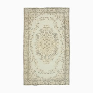 Alfombra vintage oriental antigua beige anudada a mano