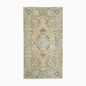 Alfombra vintage turca beige antigua hecha a mano