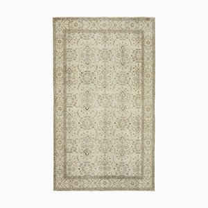 Orientalischer antiker handgeknüpfter Vintage Teppich in Beige