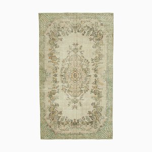 Alfombra vintage oriental de lana oriental beige anudada a mano