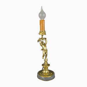 Lámpara de mesa en forma de querubín de bronce y mármol, años 20