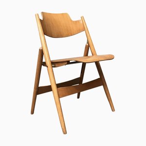 Sedia pieghevole in legno di Egon Eiermann per Wilde + Spieth, anni '60