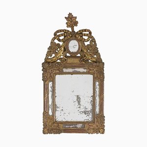 Espejo estilo Louis XVI pequeño de madera dorada