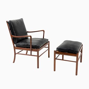 Poltrona Mid-Century coloniale con ottomana di Ole Wanscher per Poul Jeppesens Møbelfabrik, set di 2