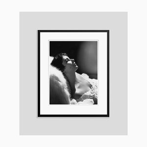 Elizabeth Taylor Reclining in Bed Silver Gelatin Resin Print Framed in Black by Baron