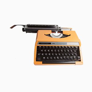 Orangefarbene Reed 100 Schreibmaschine aus Silber von Seiko co. Ltd, 1970er