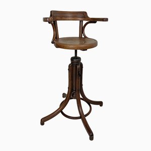 Silla de barbero infantil antigua