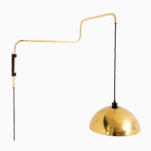 Kippbare Mid-Century Wandlampe von Arredoluce, 1960er