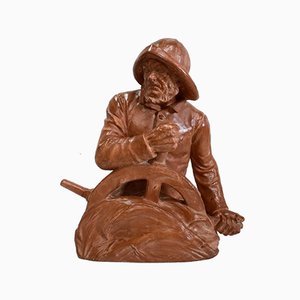 L. Morice, Busto in terracotta, Pescatore al timone