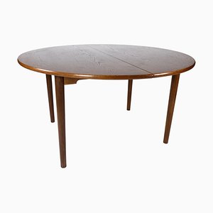 Mesa de comedor danesa de roble oscuro, años 60