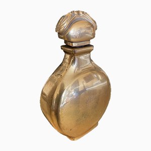 Bote de perfume Art Déco de vidrio dorado de Caron Paris