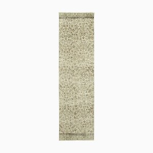 Tappeto beige sovratinto