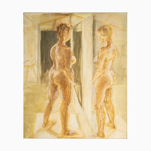 Mujer desnuda mirando en un espejo
