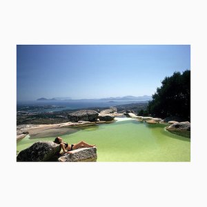 Sunbather on Rock, Slim Aarons, XX secolo