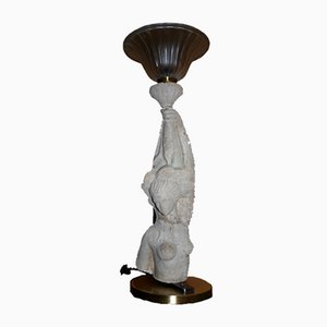 Lampada da tavolo a forma di busto in pietra
