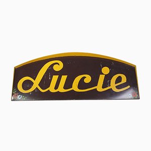 Señal de calle de negocios Lucie, años 80