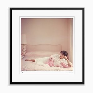 Joan Collins Relaxes Archival Pigment Print Framed in Black by Slim Aarons